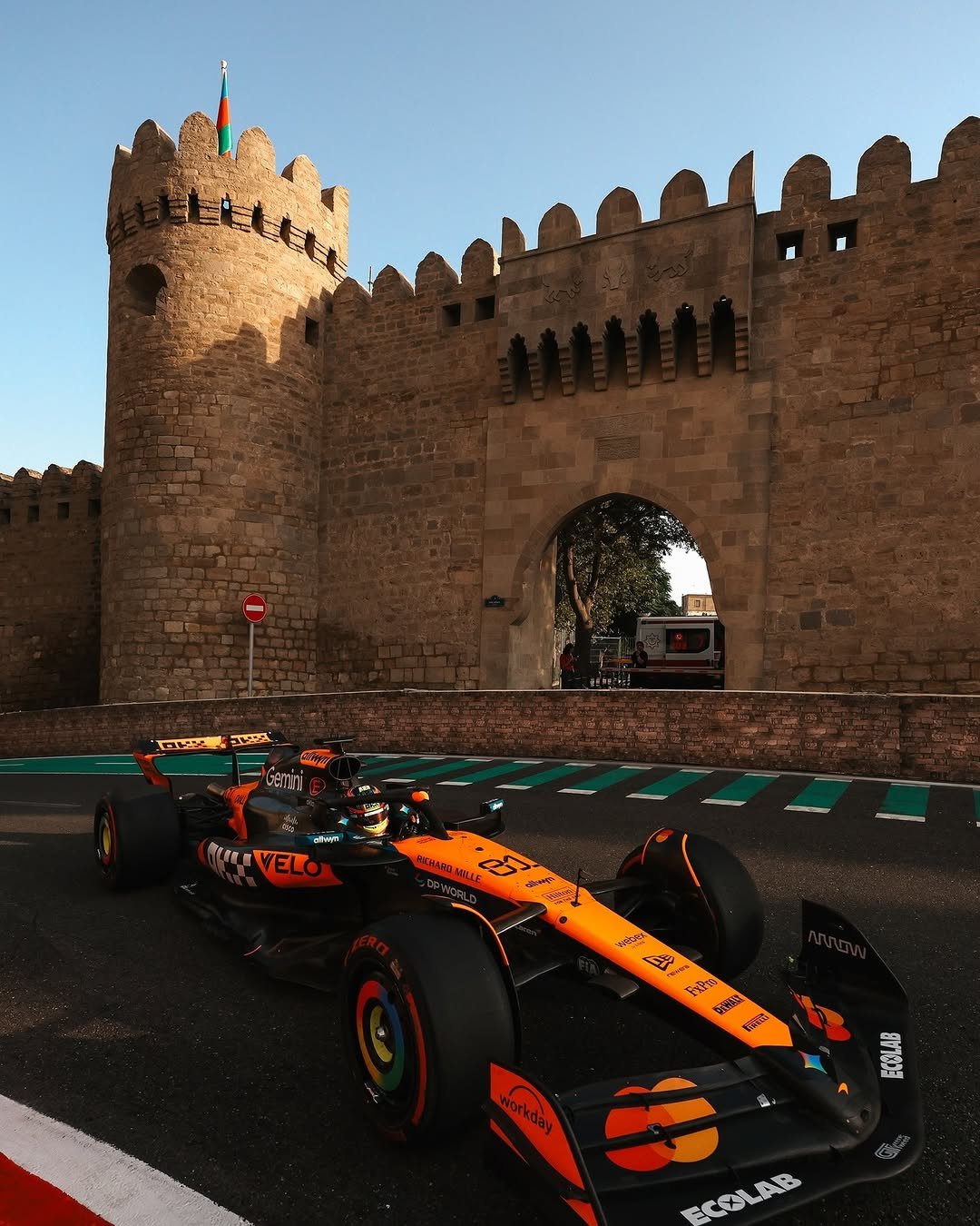 Photo by McLaren on December 17, 2025. May be an image of racing vehicles, race car and text.