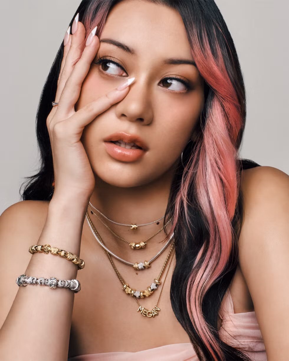 Photo by MEGAN MEI-YOK SKIENDIEL on January 14, 2026. May be a closeup of one or more people, makeup, hair, necklace, choker and text.