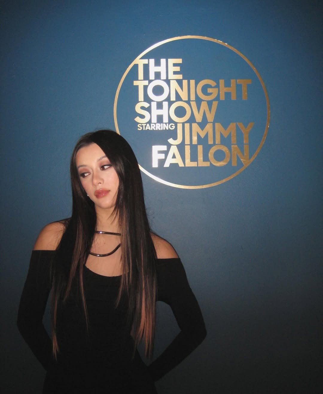 Photo by MEGAN MEI-YOK SKIENDIEL on February 04, 2026. May be an image of television, microphone, poster, magazine, night and text that says 'THE TONIGHT SHOW STARRING JIMMY FALLON'.