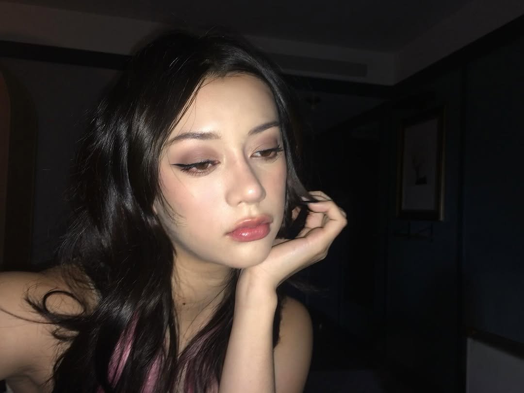 Photo by MEGAN MEI-YOK SKIENDIEL on November 19, 2025. May be an image of one or more people, hair, eyeliner, makeup, lipstick and text.