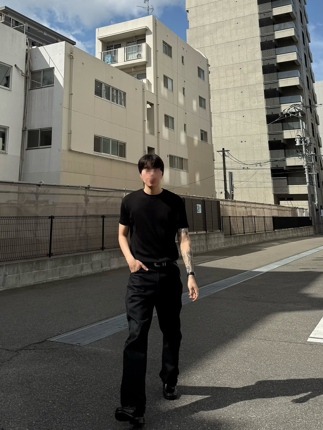 Photo by 옷미새 미홀 on June 21, 2025. May be an image of 1 person, street, buildings and text.