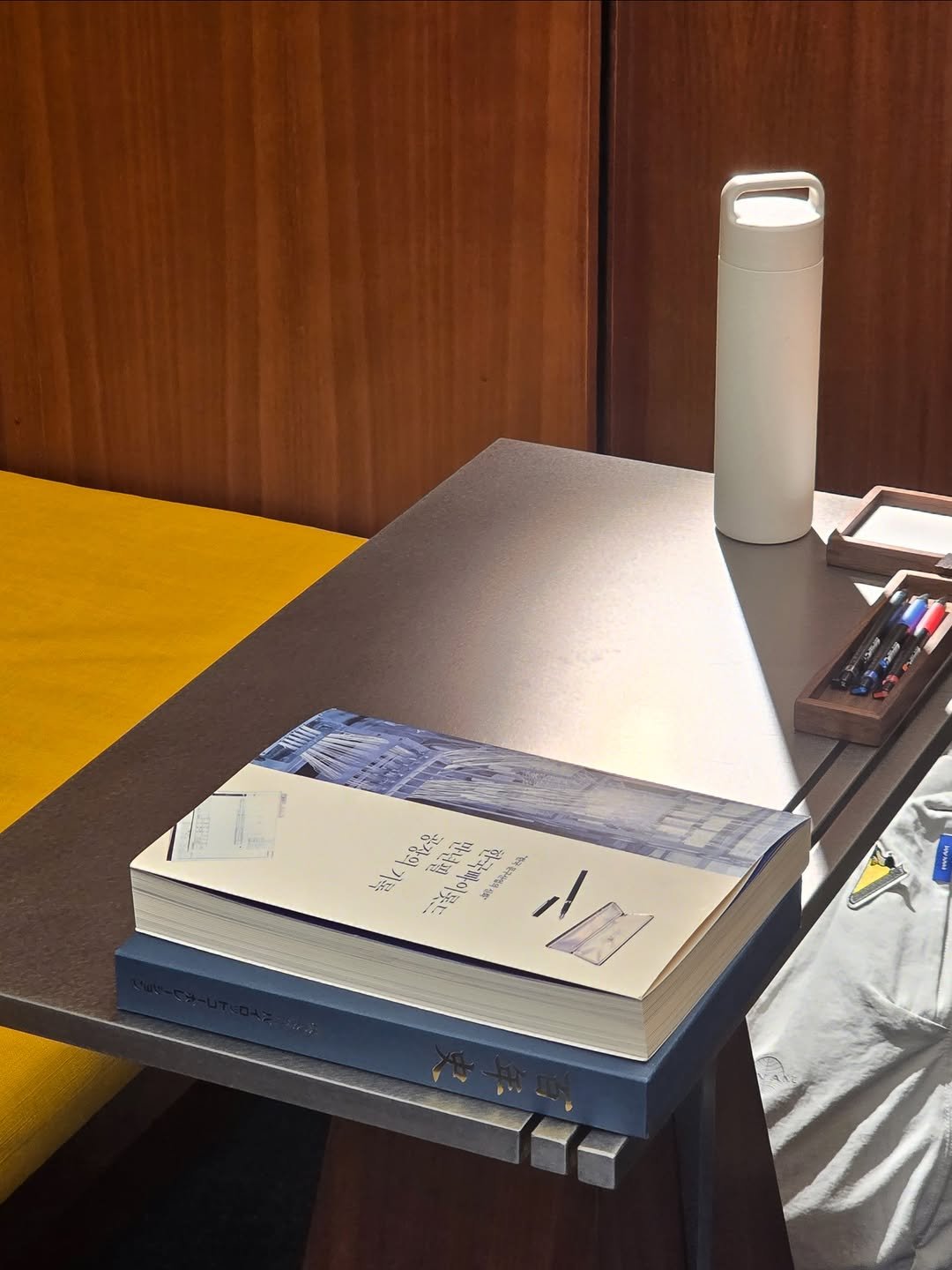 Photo shared by 서 은아 on December 12, 2025 tagging @jinpyokim, and @saem.space. May be an image of table, socket, desk, portable cassette player, bureau and text.