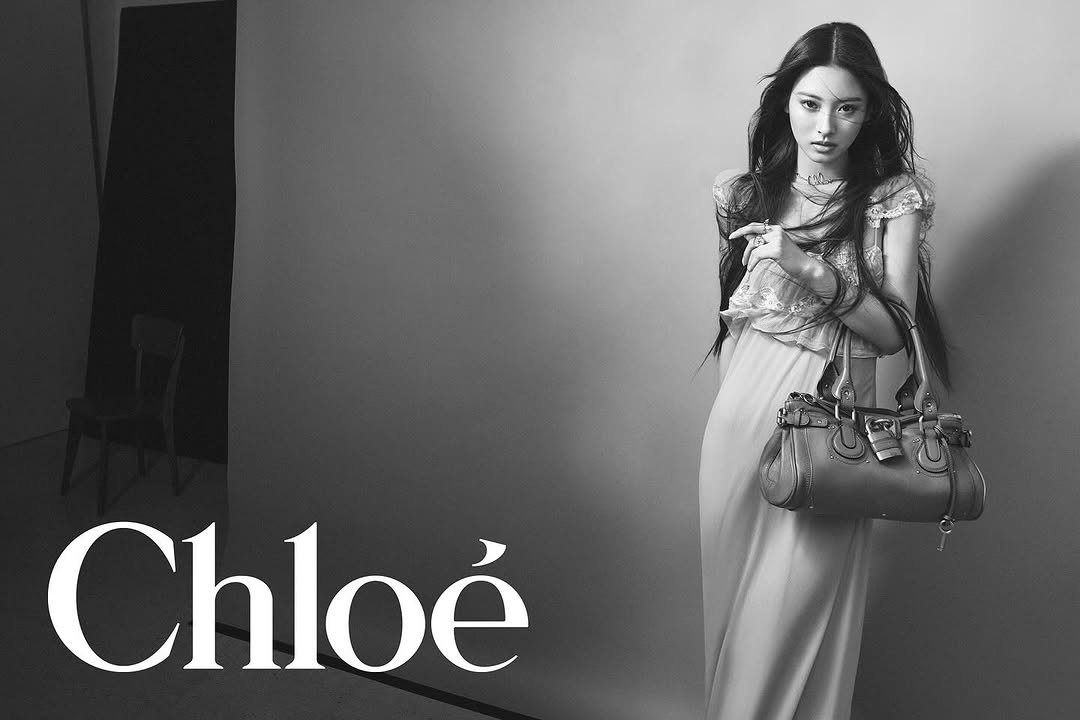 Photo shared by Chloé on September 25, 2025 tagging @chemena, @davidsimsofficial, and @meovv. May be a black-and-white image of 1 person, hair, makeup and text that says 'Chloe'.