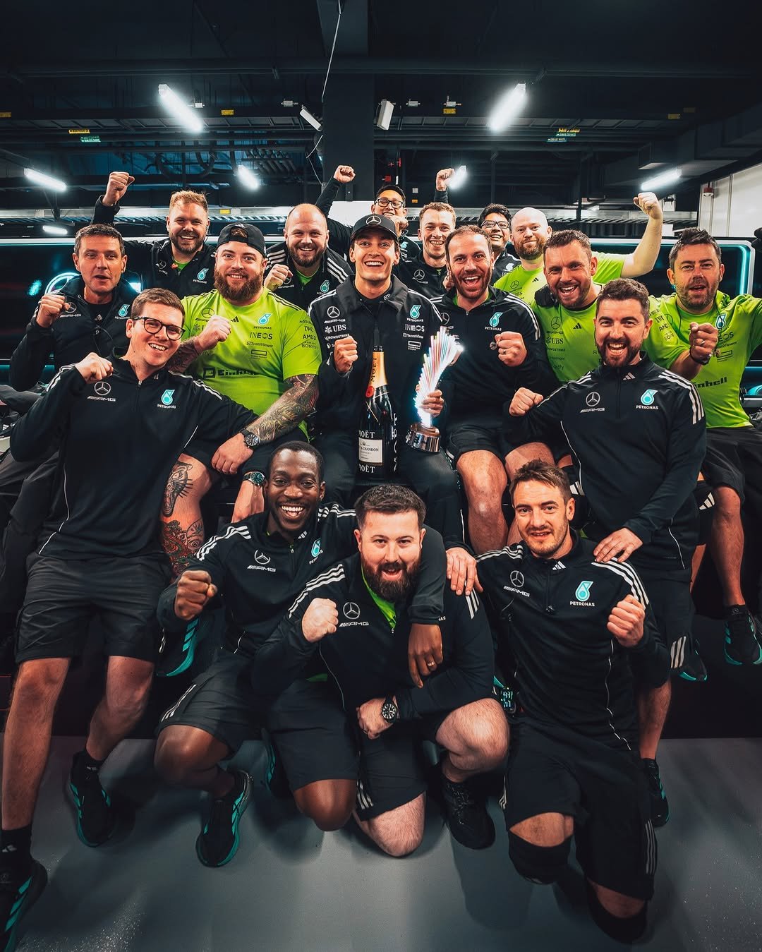 Photo shared by Mercedes-AMG Motorsport on December 16, 2025 tagging @mercedesamgf1, @mercedesamg, and @georgerussell63. May be an image of soccer, stadium and text.