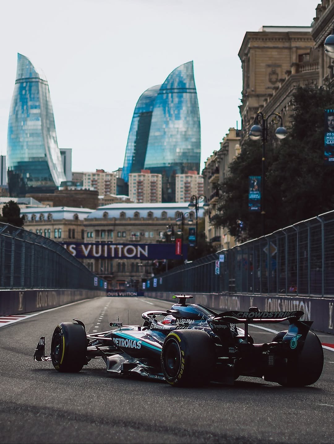 Photo shared by Mercedes-AMG Motorsport on September 21, 2025 tagging @mercedesamgf1, @mercedesamg, @mercedesbenzaz, @bakucitycircuit, and @kimi.antonelli. May be an image of racing vehicles, race car and text.