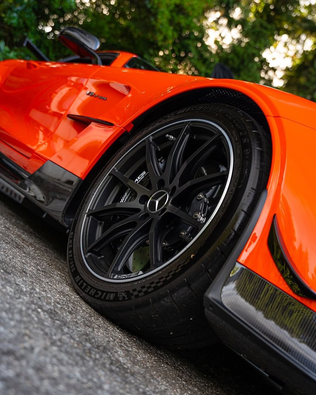 Photo by Mercedes-AMG on November 04, 2025. May be an image of car, road and text.