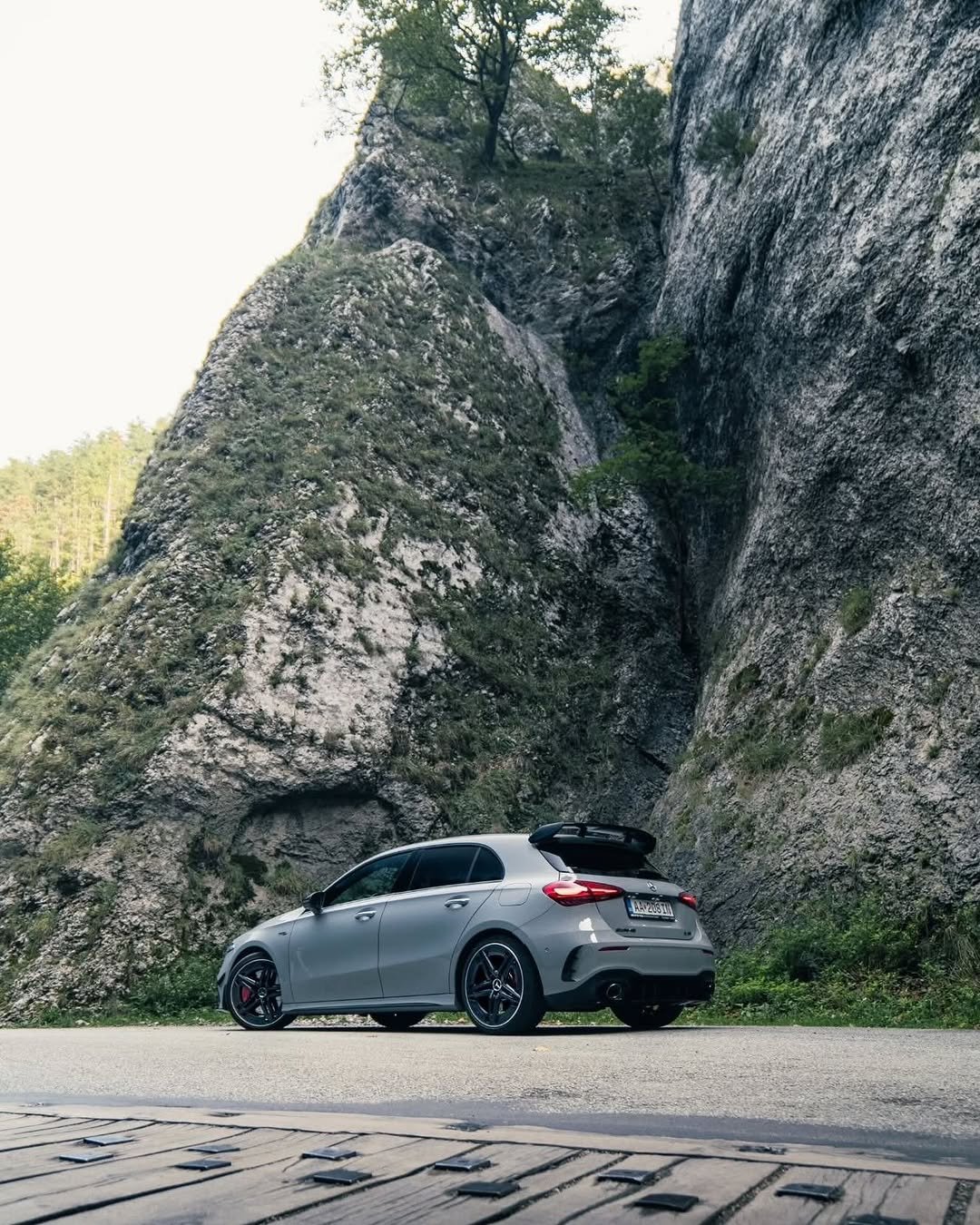 Photo by Mercedes-AMG on December 15, 2025. May be an image of car, road and text.