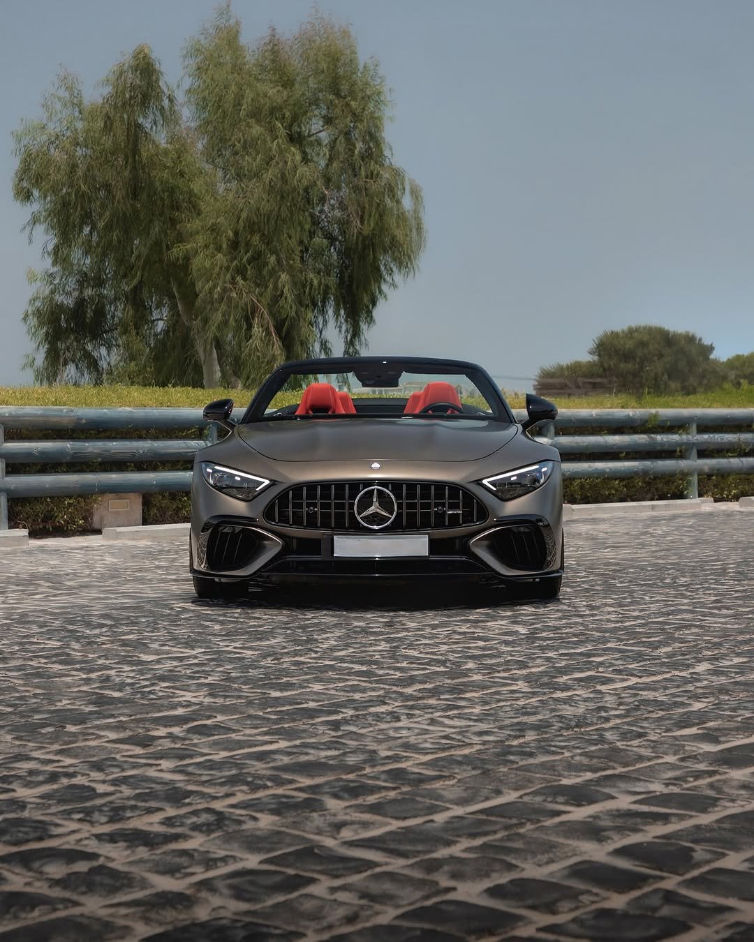 Photo by Mercedes-AMG on November 02, 2025. May be an image of car, road and text.