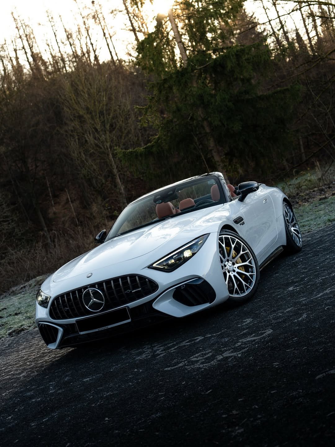 Photo by Mercedes-AMG on February 18, 2026. May be an image of roadster, convertible, sedan, wheel, road and text.