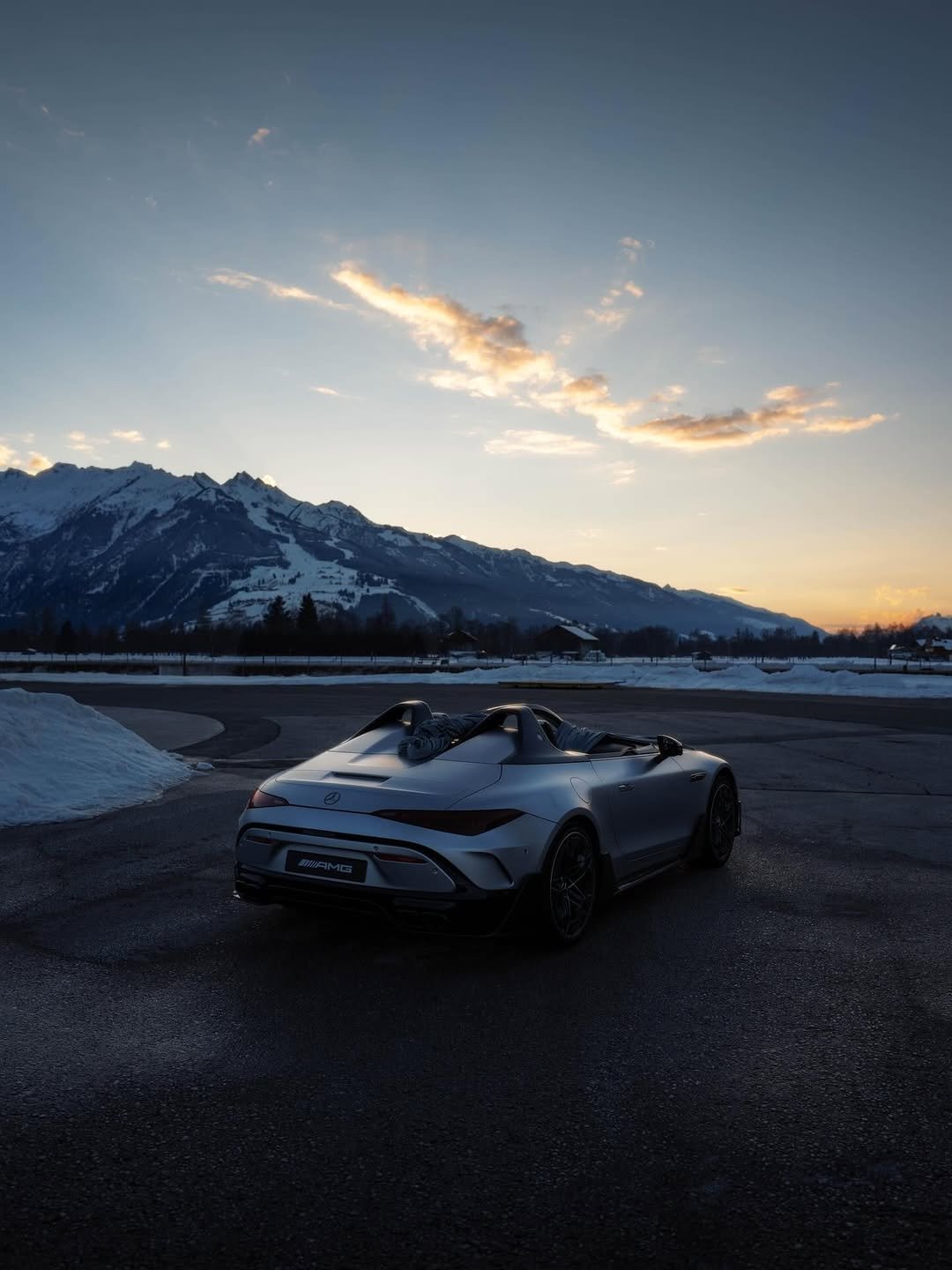 Photo by Mercedes-AMG on February 18, 2026. May be an image of race car, convertible, roadster, wheel, road and text.