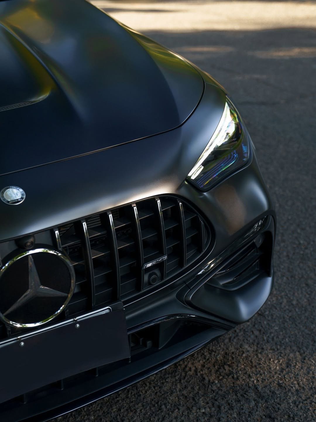 Photo by Mercedes-AMG on April 25, 2026. May be an image of wheel, sedan and text.