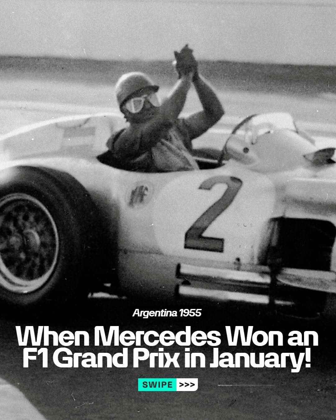 A black and white picture of Juan Manuel Fangio crossing the line and celebrating winning the 1955 Argentinian Grand Prix. Fangio has his hands up in triumph. At the bottom of the image, the words 'Argentina 1955' and 'When Mercedes Won an F1 Grand Prix in January' can be read in white text.
