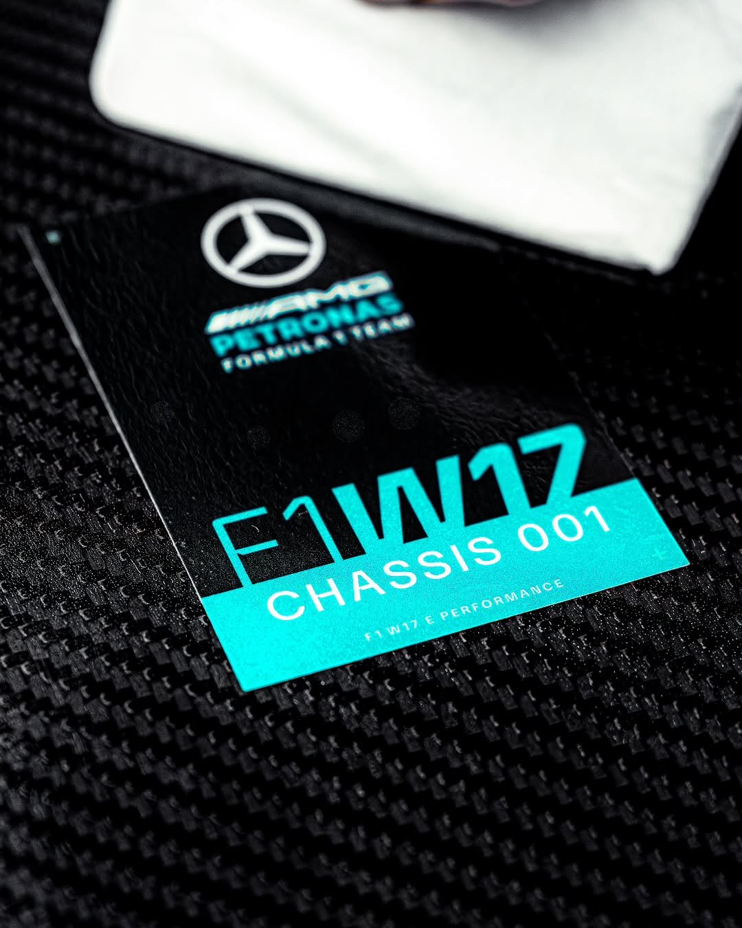 The F1 W17 Chassis Badge inside the car. It has the Team logo F1 W17 and Chassis 001 on it