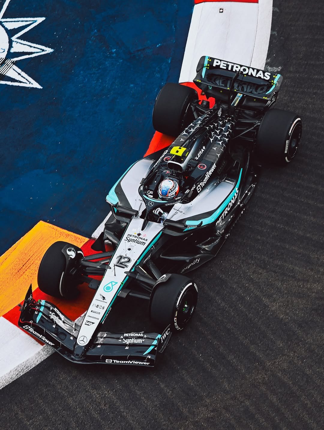 Photo shared by Mercedes-AMG Motorsport on October 03, 2025 tagging @mercedesamgf1, @mercedesbenzsg, and @kimi.antonelli. May be an image of racing vehicles, race car and text.