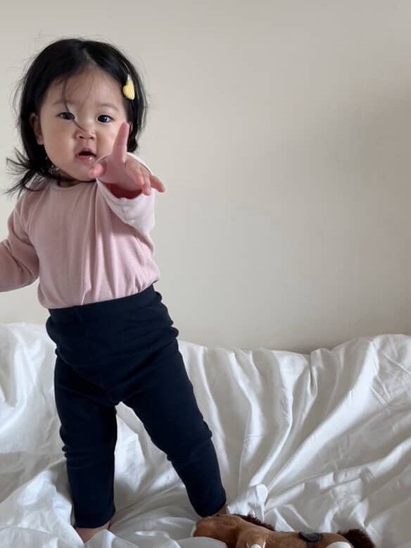 Photo by 메르모던(me.mo.b) on September 30, 2025. May be an image of 1 person, baby, baby shoes, overskirt and text.