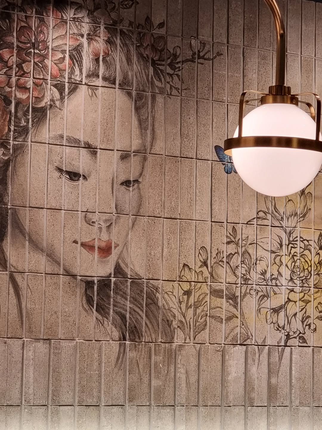 Photo by merry J on January 27, 2026. May be an image of lamp shade, brick wall and text.