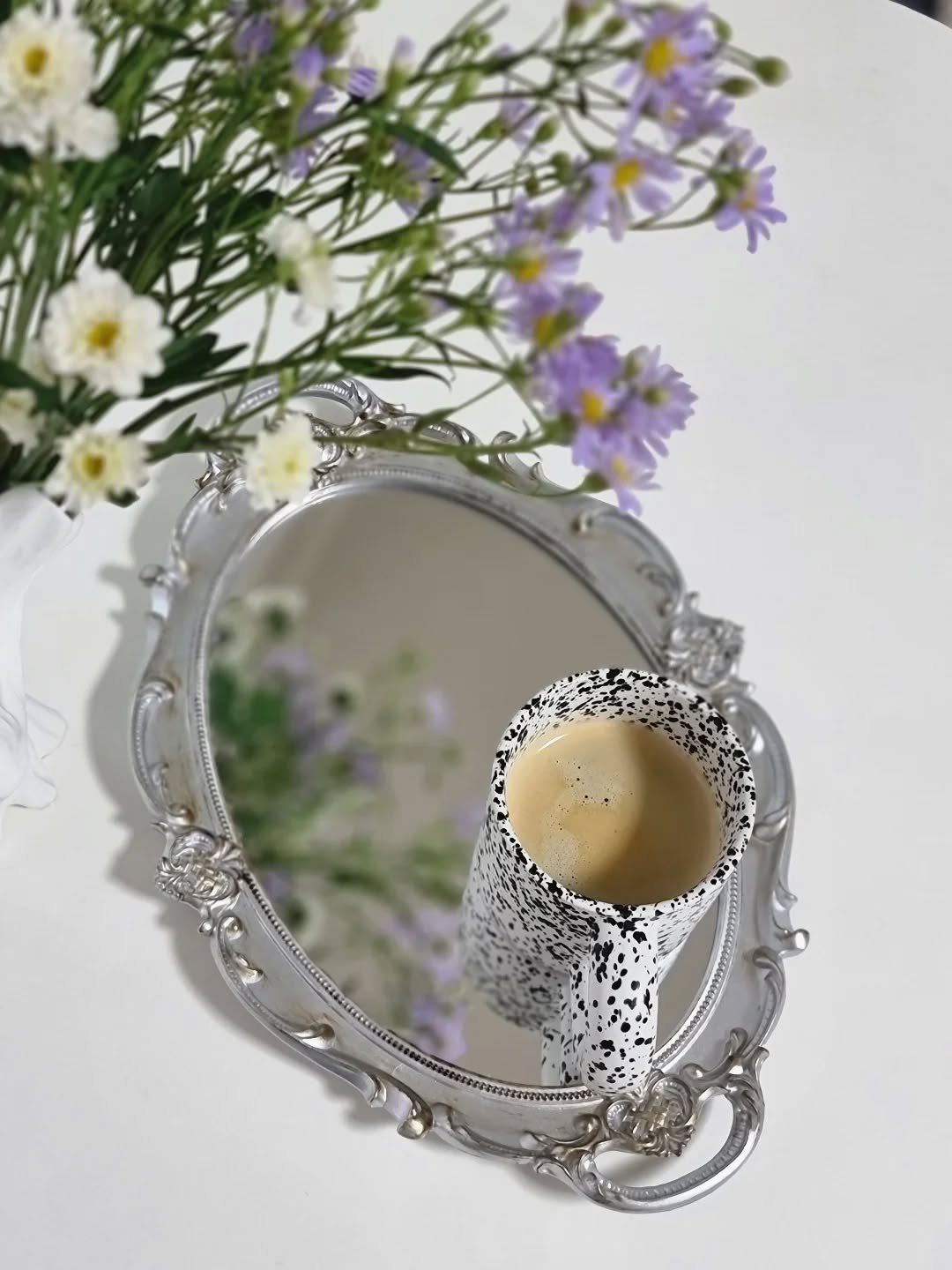 Photo by merry J on September 18, 2025. May be an image of kitchenware, tableware, mirror, candle, scorpion grass, French lavender and text.