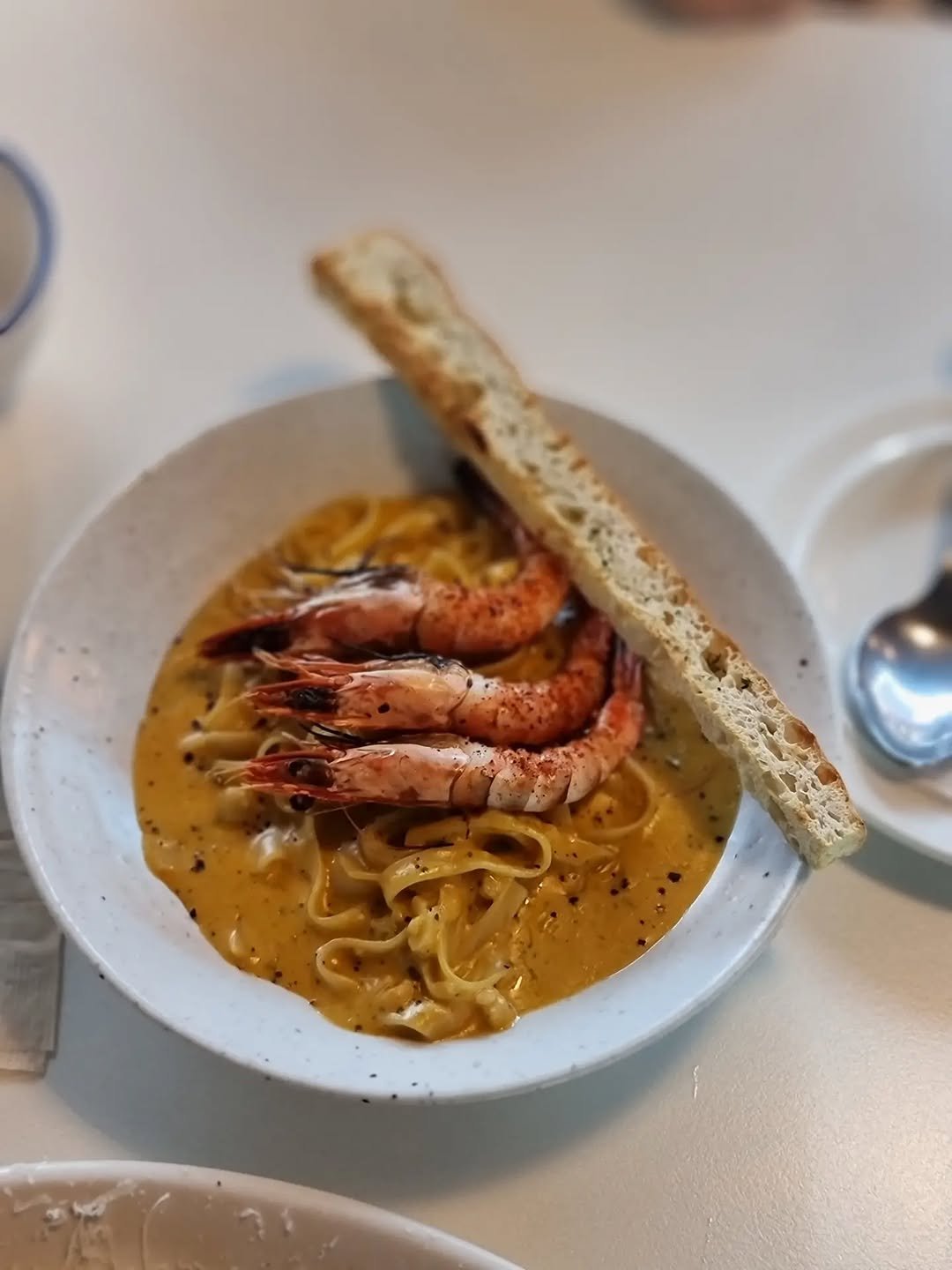 Photo by merry J on April 18, 2026. May be an image of shrimp, pasta, prawn, noodles and text.