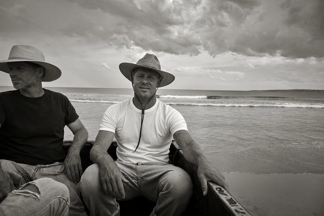 Photo shared by Akubra Hats | Australian Icons on December 24, 2025 tagging @mfanno, and @jarrad_howse. May be a black-and-white image of one or more people and text.