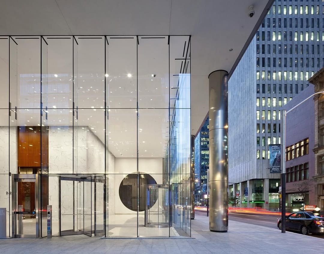 Photo by Micah Lexier on February 15, 2026. May be an image of sliding door, skyscraper, hallway, buildings and text.