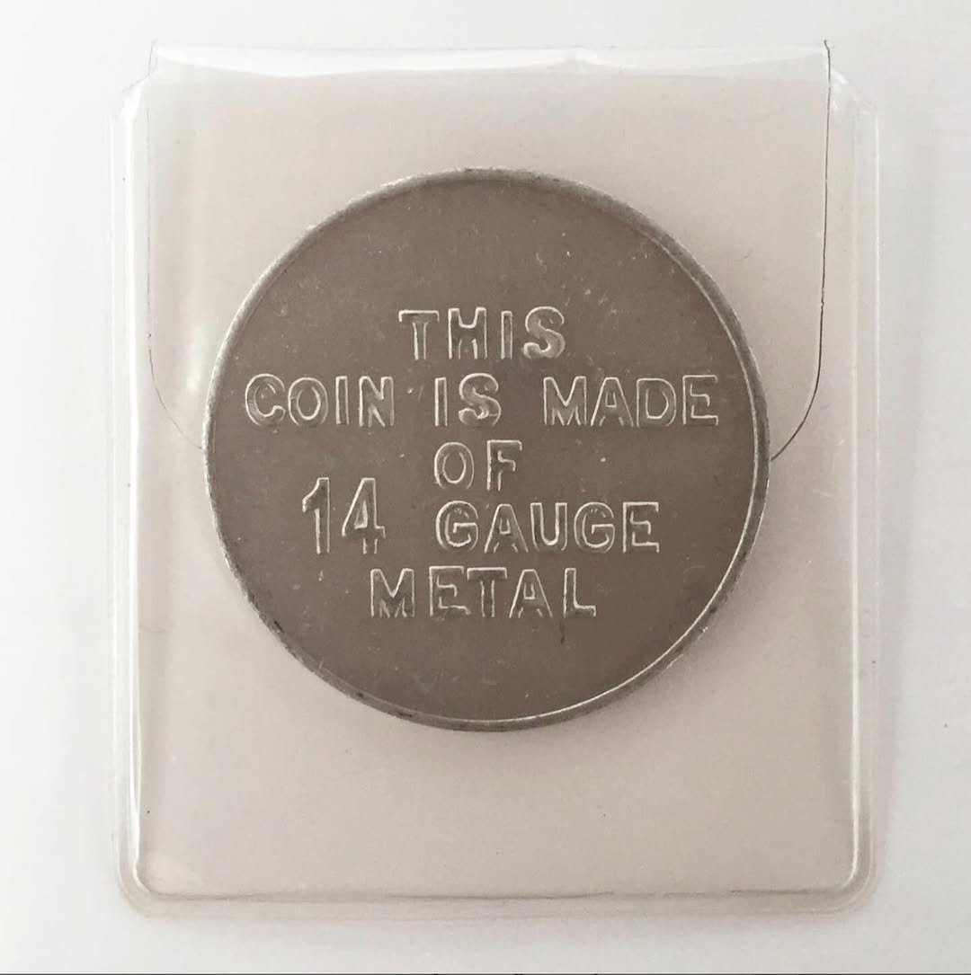 Photo by Micah Lexier on April 18, 2026. May be an image of text that says 'TMIS COINISMADE COIN IS MADE 14 ወጥ GAUGE M METAL'.