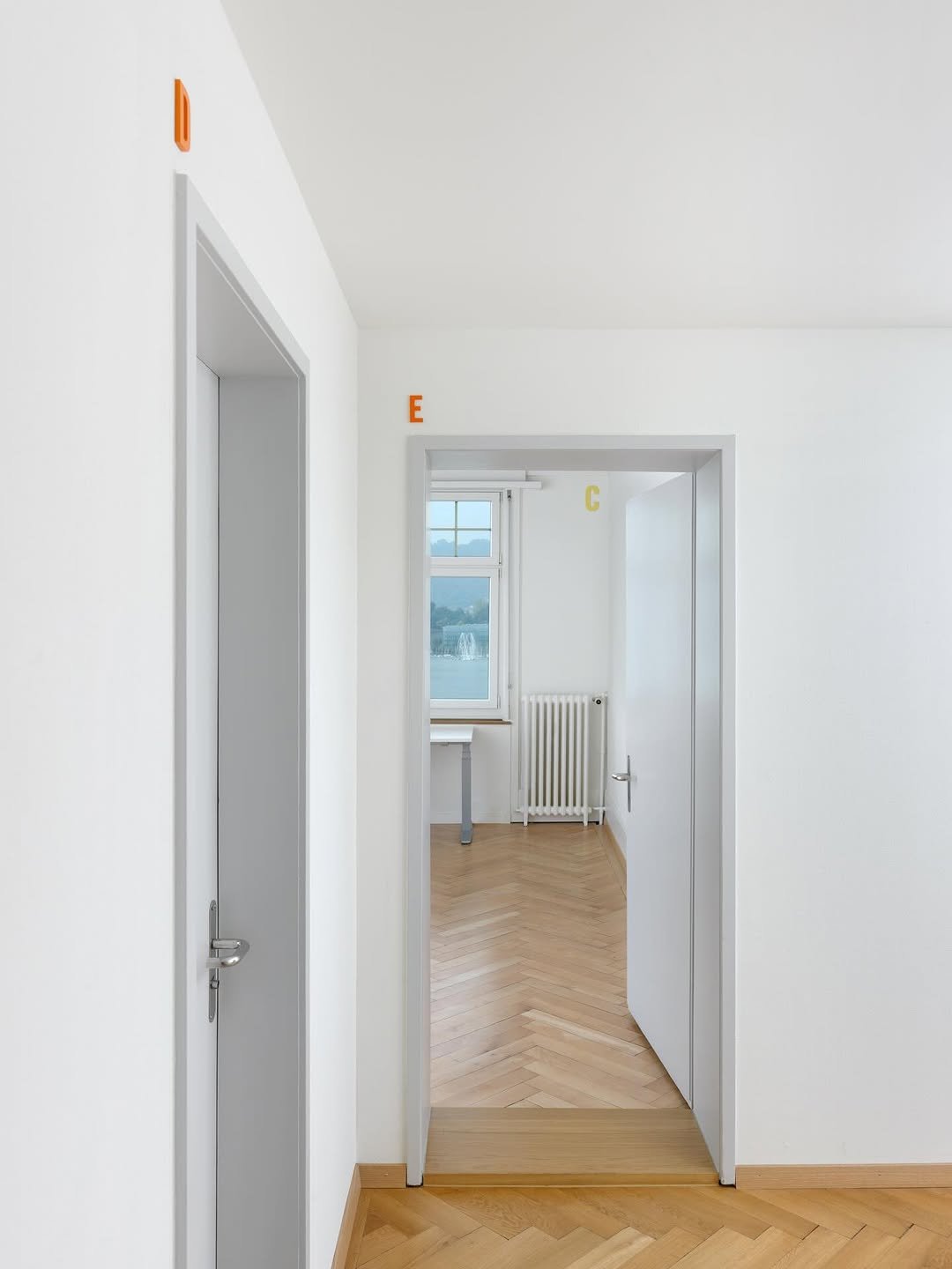 Photo by Micah Lexier on April 25, 2026. May be an image of sliding door, hallway, door and text.