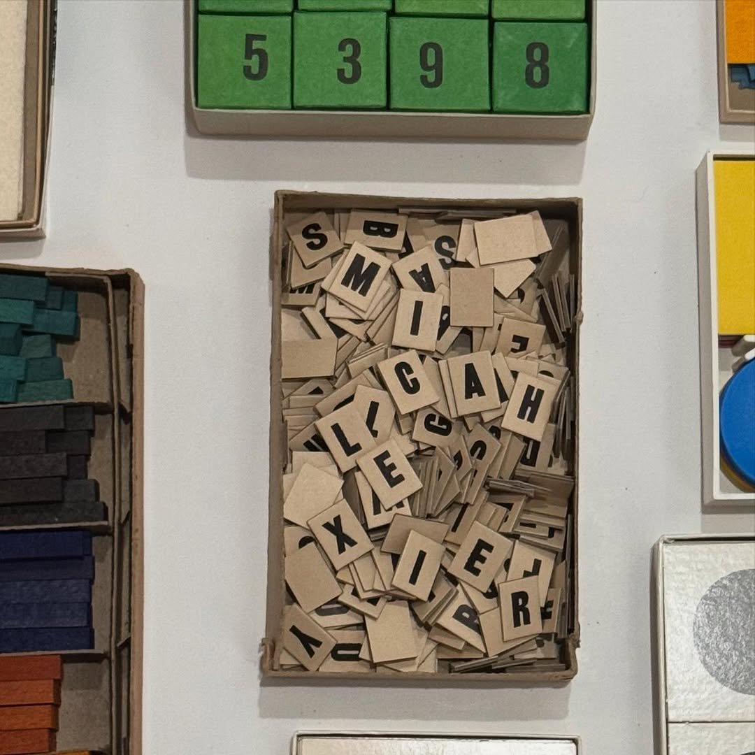 Photo by Micah Lexier on September 20, 2025. May be an image of childrens toy, box, scrabble, crossword puzzle and text.
