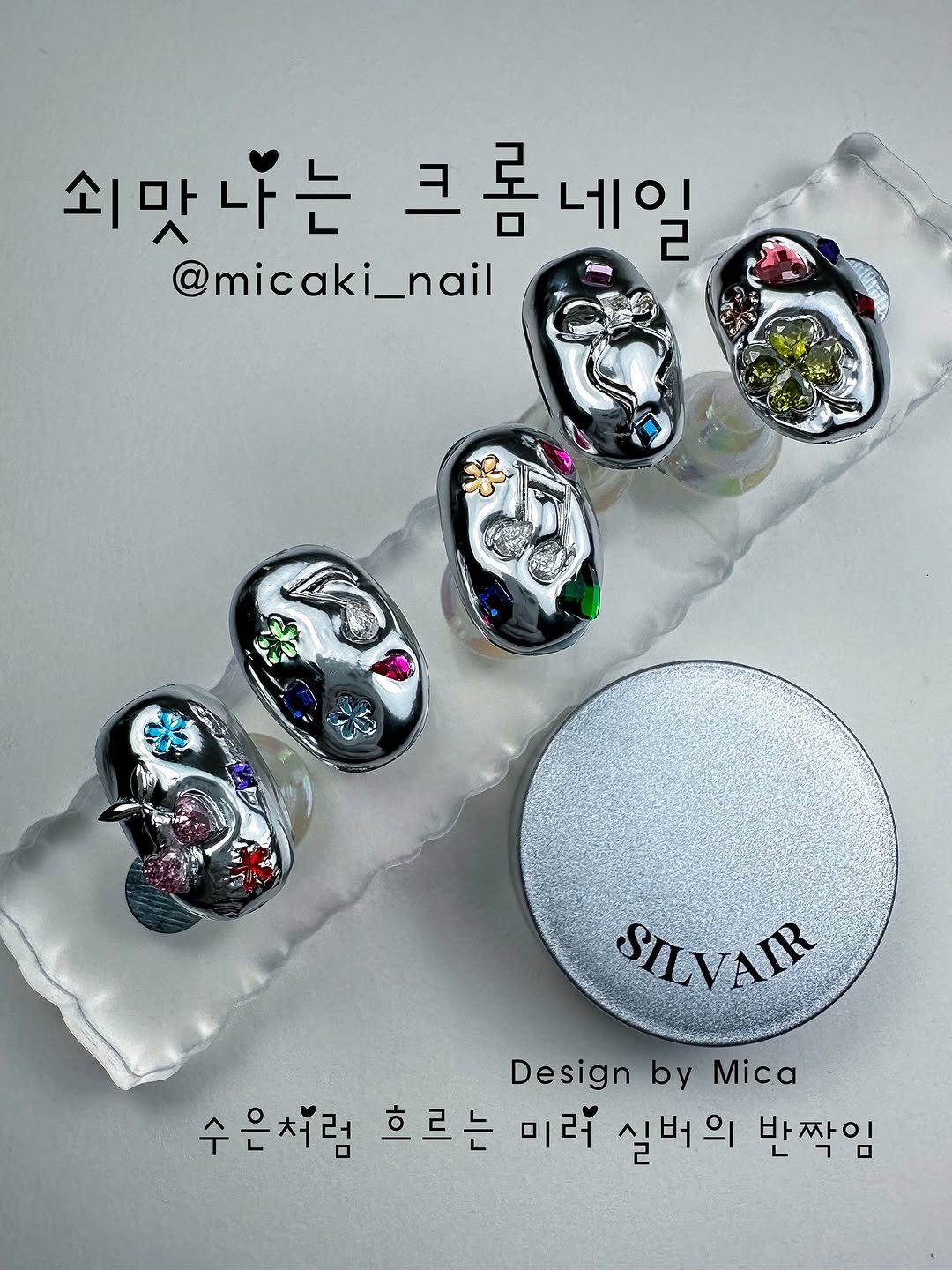 Photo shared by Mica Nail     Kakao Id*~micaki on July 15, 2025 tagging @yeosi_boutique, @micaki_nail, @mil__nail, @make.n_shop, @make.n_global, @make.n_official, @rabo_gel_nail, @make.n_jp, and @rabogel_official. May be an image of one or more people, fingernails and paper weight.