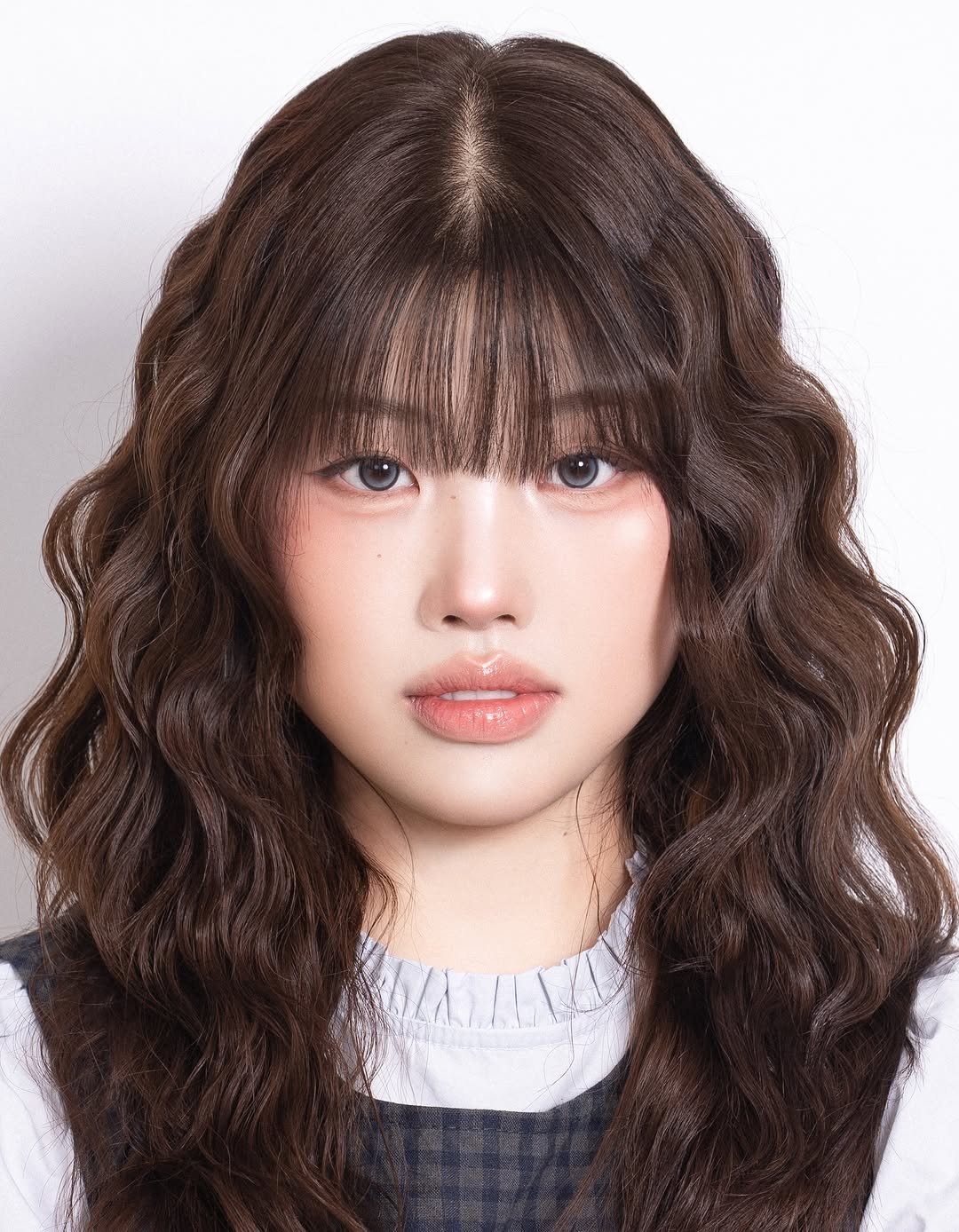 Photo by 이노마 on January 08, 2026. May be an image of one or more people, bangs, braids, makeup and text.