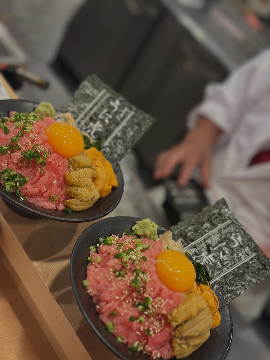 Photo by 김미희 on September 08, 2025. May be an image of egg yolk, sushi, sashimi, poached egg and text.