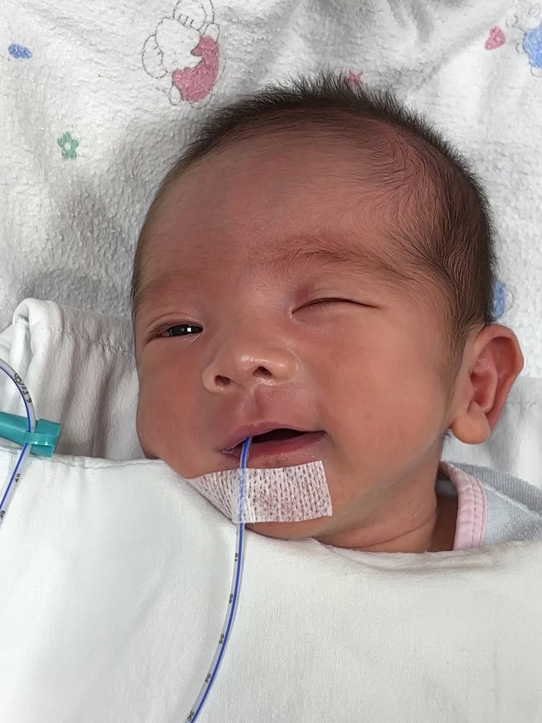 Photo shared by 김유진 on August 12, 2025 tagging @seokwooju, and @milk._.couple. May be an image of 1 person, baby and hospital.