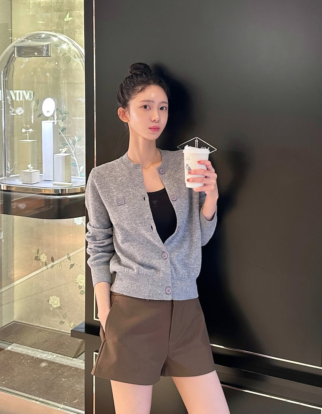 Photo by 김민희 on October 29, 2025. May be an image of top, shorts and text.