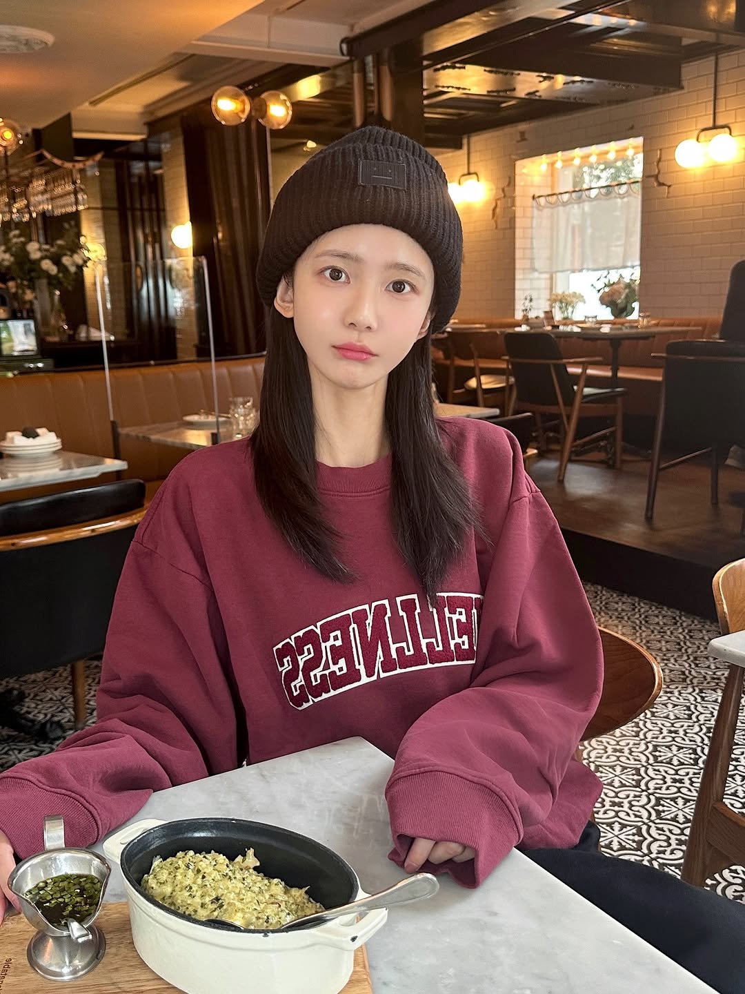 Photo by 김민희 on October 22, 2025. May be an image of parka, sweatshirt, turtleneck and text.