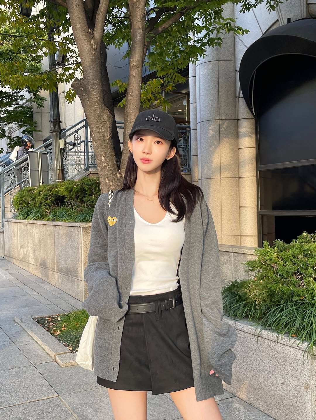 Photo by 김민희 on October 24, 2025. May be an image of overcoat, duffle coat, shorts, parka, skirt, top, miniskirt and text.