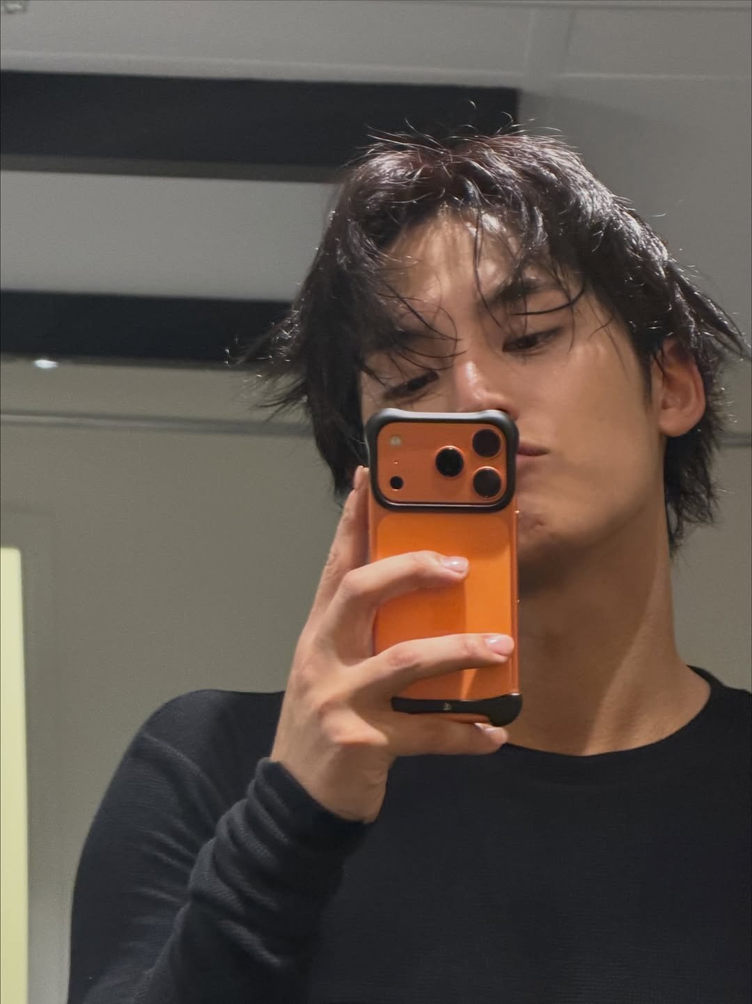 Photo by 김민규 on November 23, 2025. May be a selfie of one or more people, hair, phone, mirror and text.