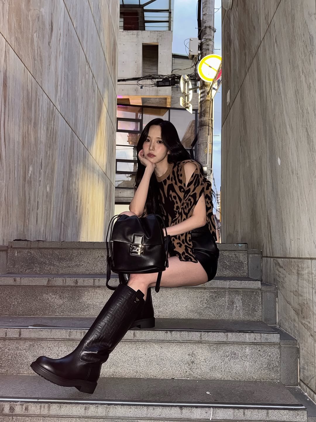 Photo by 미나 (MINA) on November 01, 2025. May be an image of boots, leather and text.