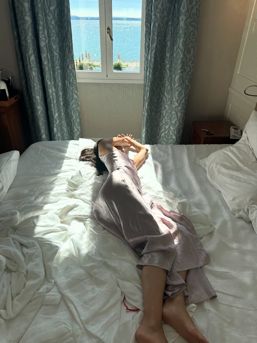 Photo by Mina 미나 on August 08, 2025. May be an image of 1 person, sleepwear, bed, mattress, bedroom and text.