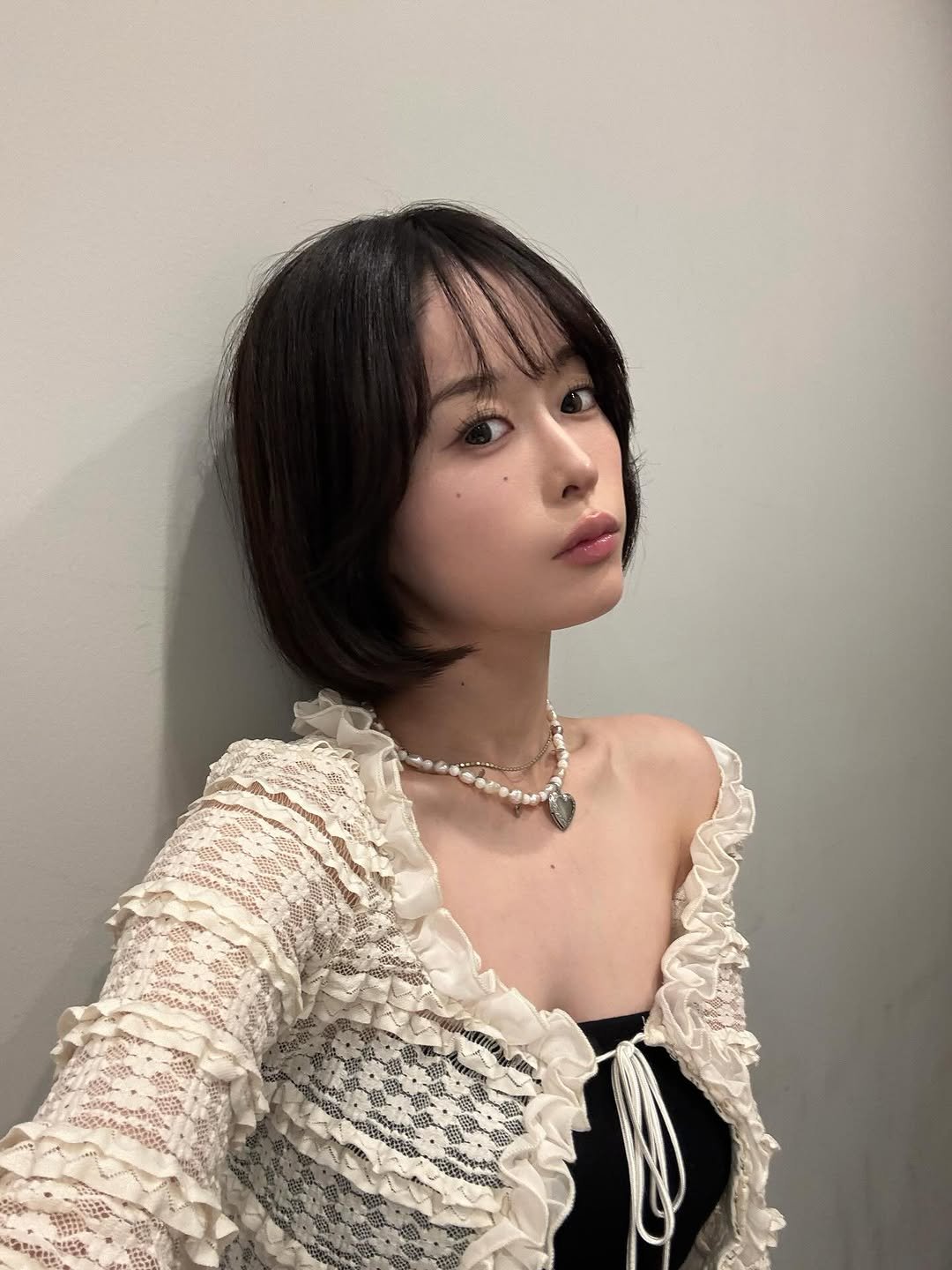 Photo shared by MINAMO on September 21, 2025 tagging @ravijour_official. May be an image of one or more people, bangs, braids, top and bolo tie.