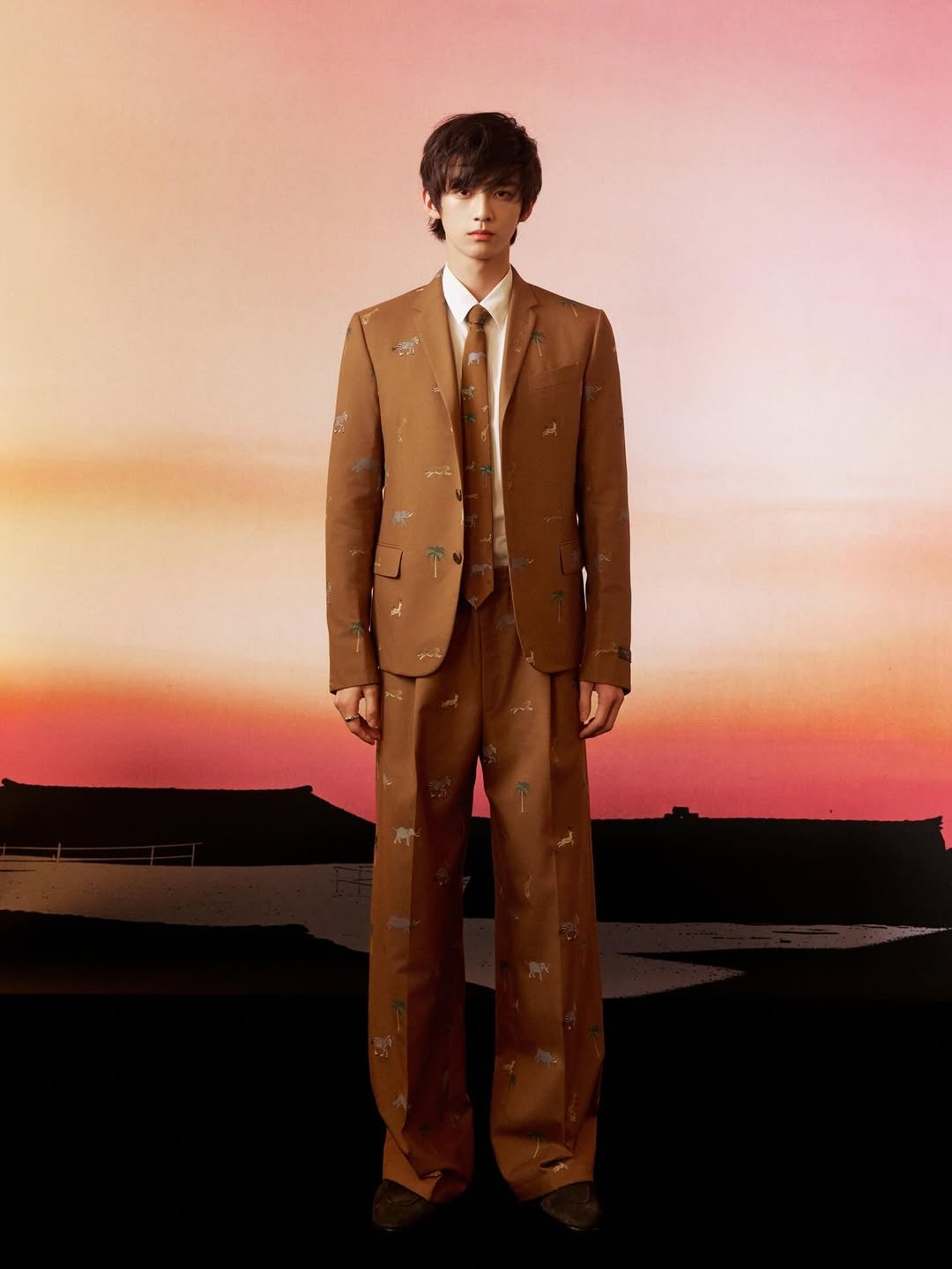 Photo by Mingweilai on March 27, 2026. May be an image of duffle coat, overcoat, bolo tie, blazer, suit and text.