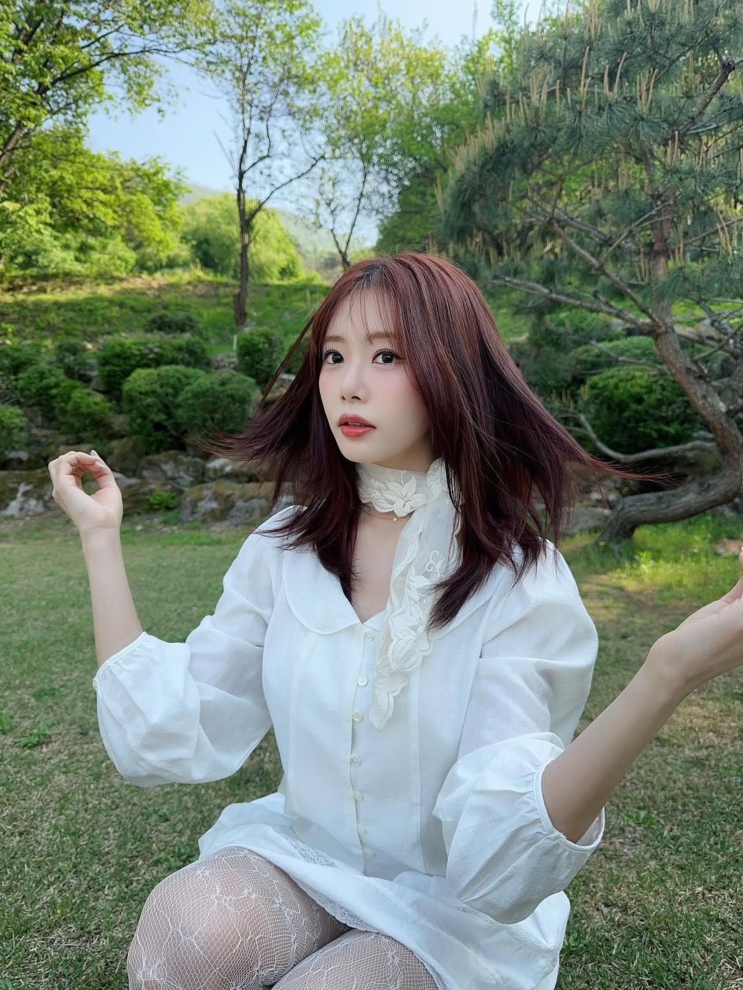 Photo by 드림캐쳐 지유 on July 14, 2025. May be an image of 1 person, hair, outdoors and text.