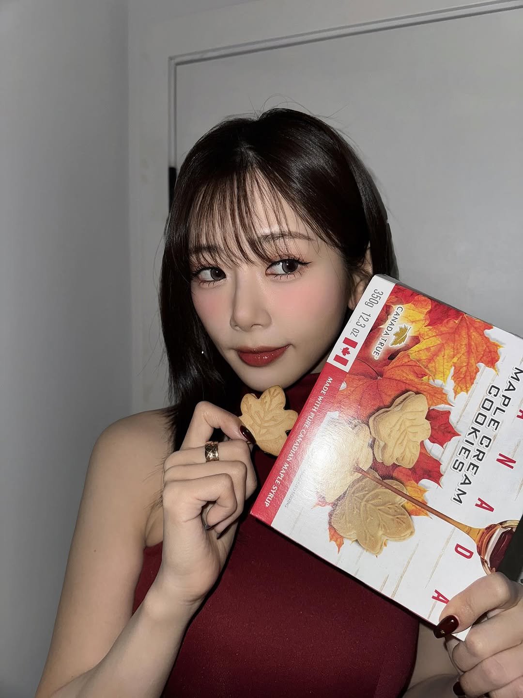 Photo by 드림캐쳐 지유 on July 27, 2025. May be an image of 1 person, hair, magazine, book and text.