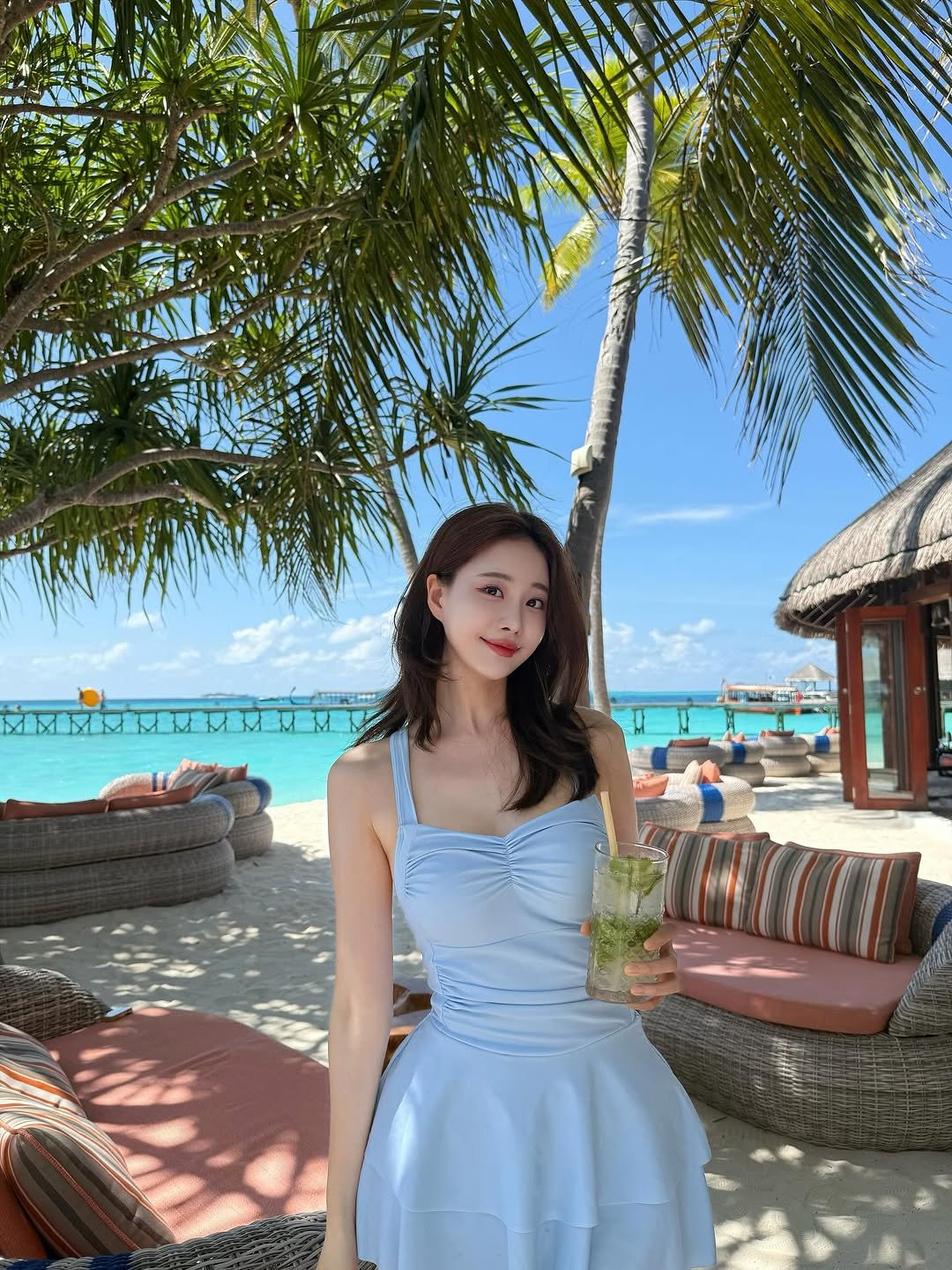 Photo by 김민영🌸아옳이 on September 29, 2025. May be an image of 1 person, dress, sundress, beach and text.