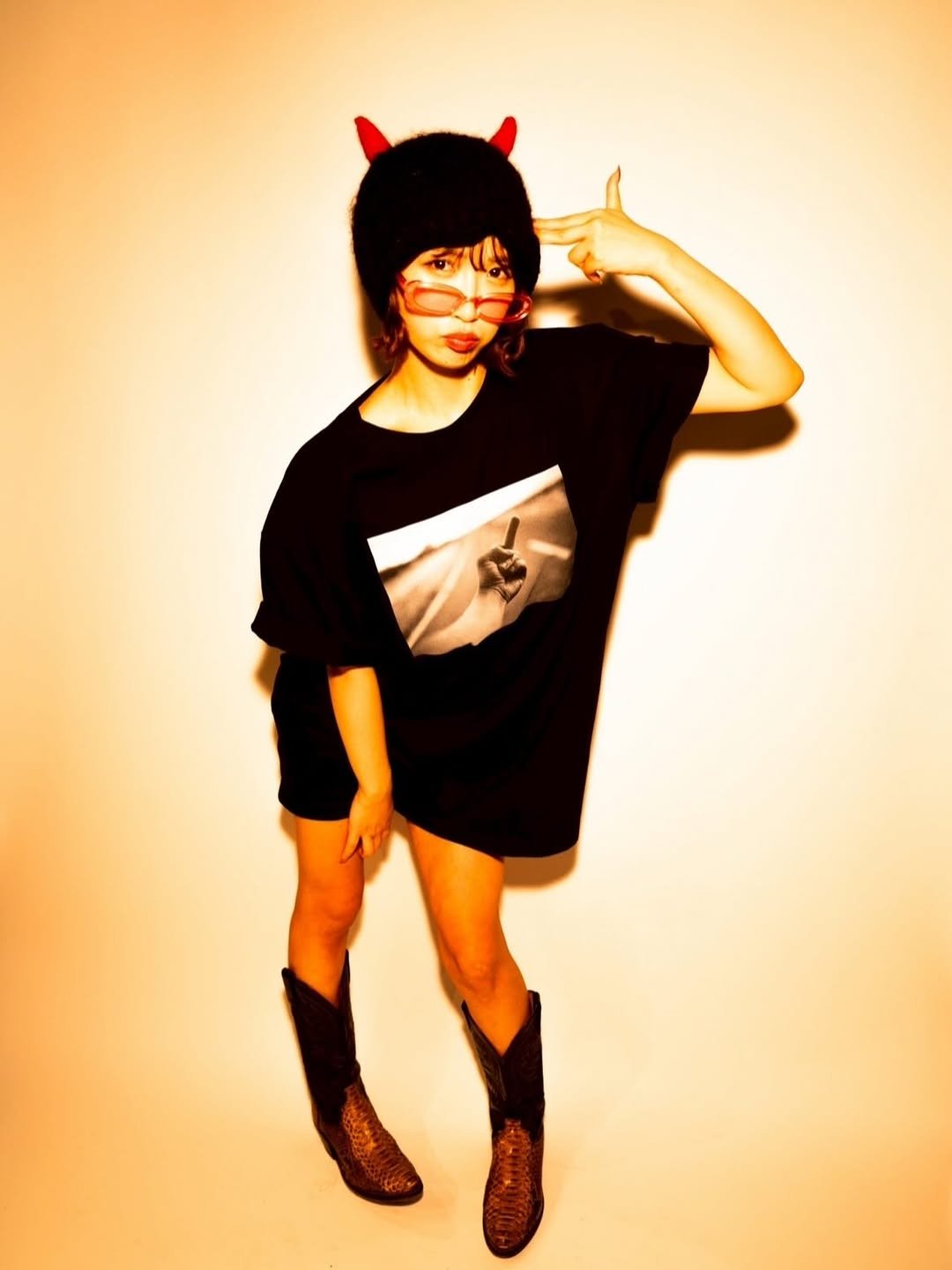 Photo by 美園和花 misono waka on January 16, 2026. May be pop art of costume, glasses, tambourine and text.