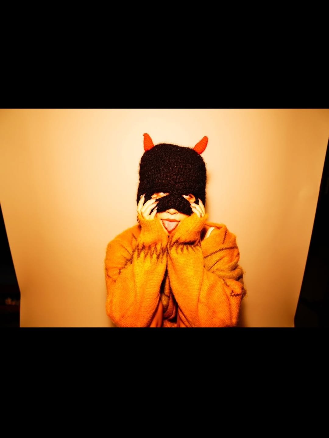 Photo by 美園和花 misono waka on January 15, 2026. May be an image of costume, face mask, sweater and text.