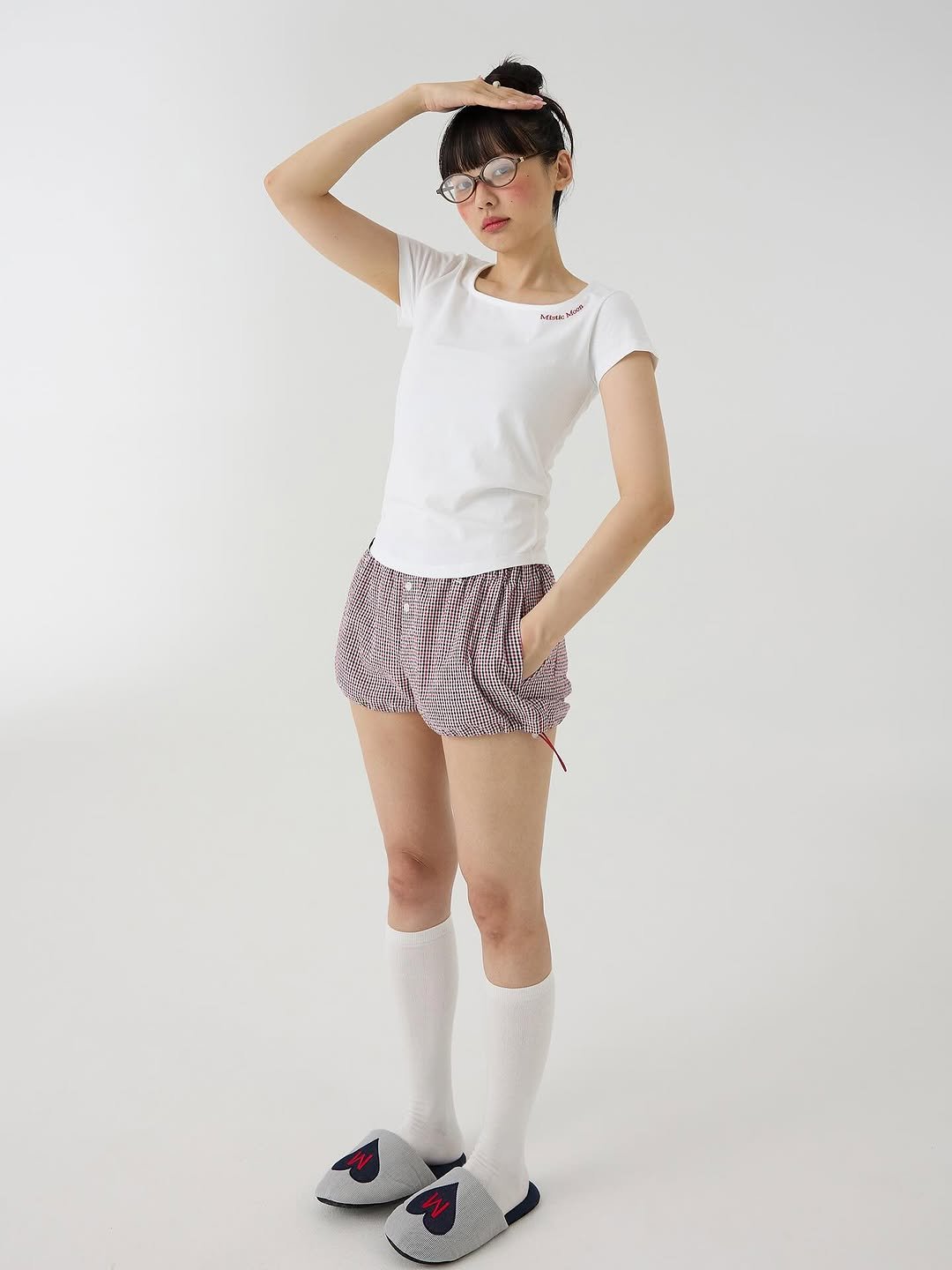Photo by Mistic Moon (미스틱문) on August 26, 2025. May be an image of 1 person, activewear, sleepwear, shorts, miniskirt, sock, sportswear, tights and text.