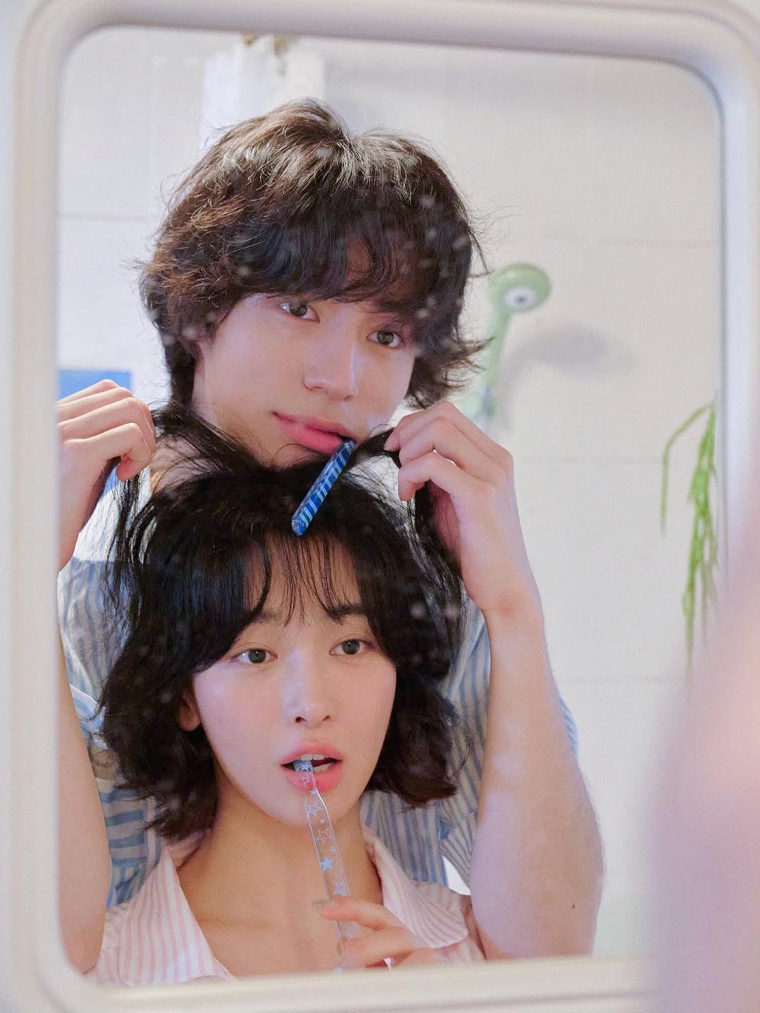 Photo by Mistic Moon (미스틱문) on September 01, 2025. May be an image of 1 person, bangs, toothbrush, mirror and text.