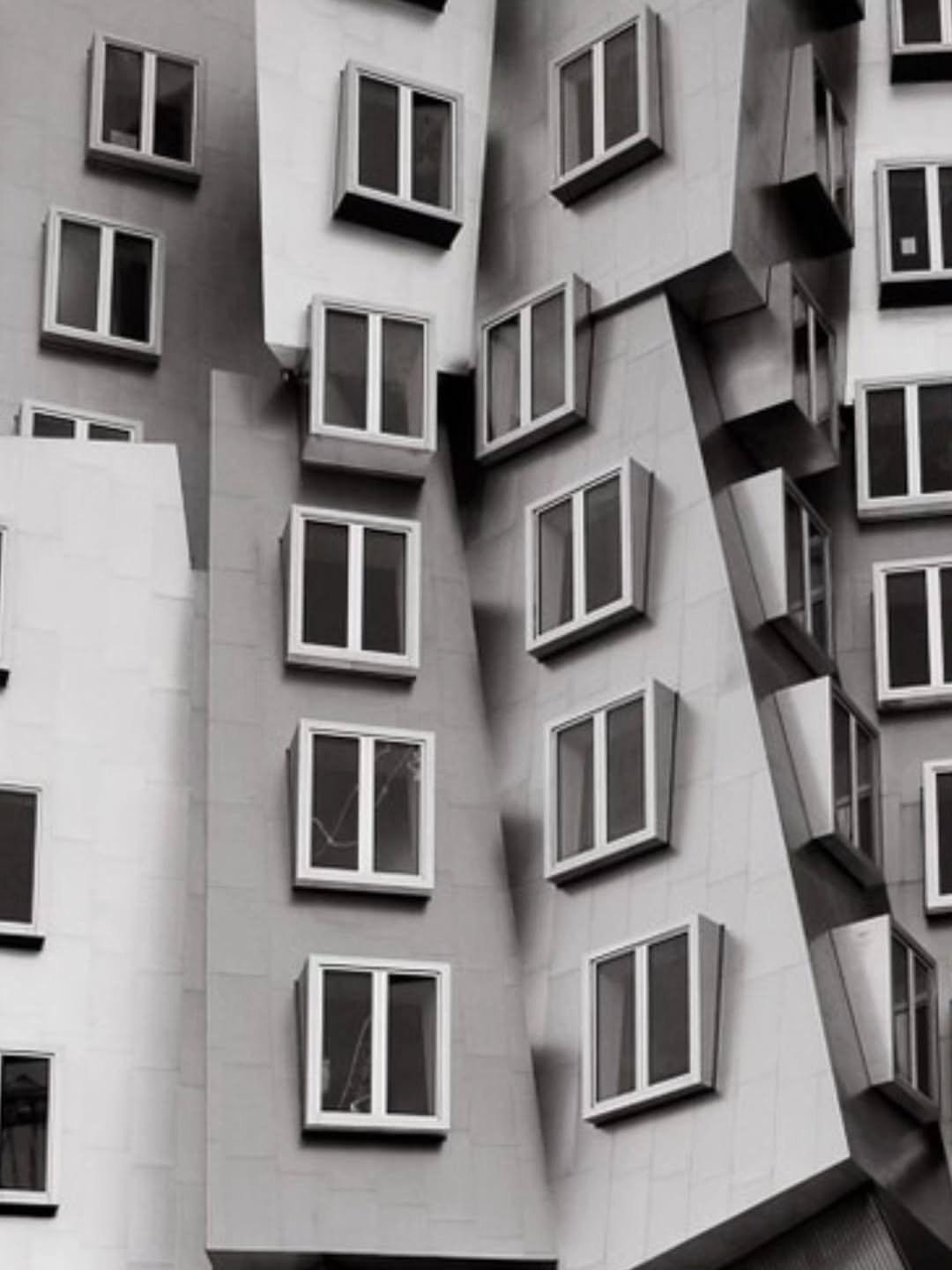Photo by MIT in MIT Stata Center (Building 32). May be a black-and-white image of buildings and text.