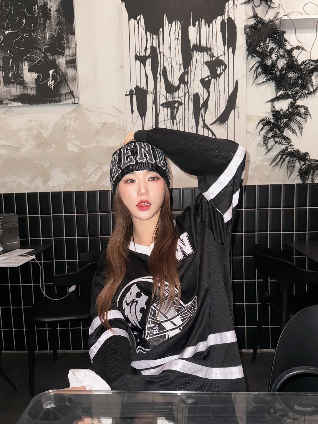 Photo by 미우 MIU on July 19, 2025. May be an image of 1 person, hat, beret, sweatshirt and text.