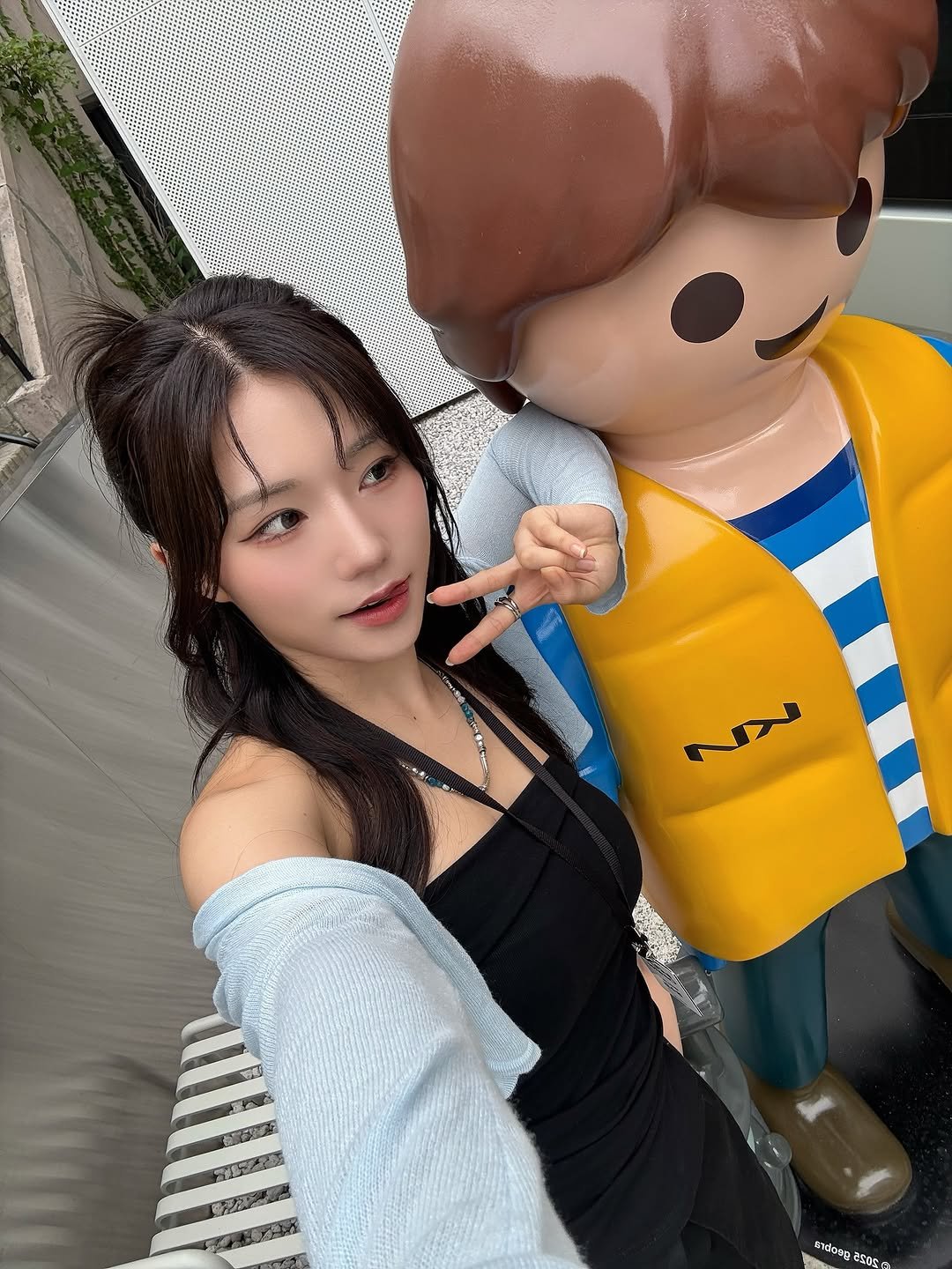 Photo by 미우 MIU on August 12, 2025. May be an image of 1 person, lego and text.