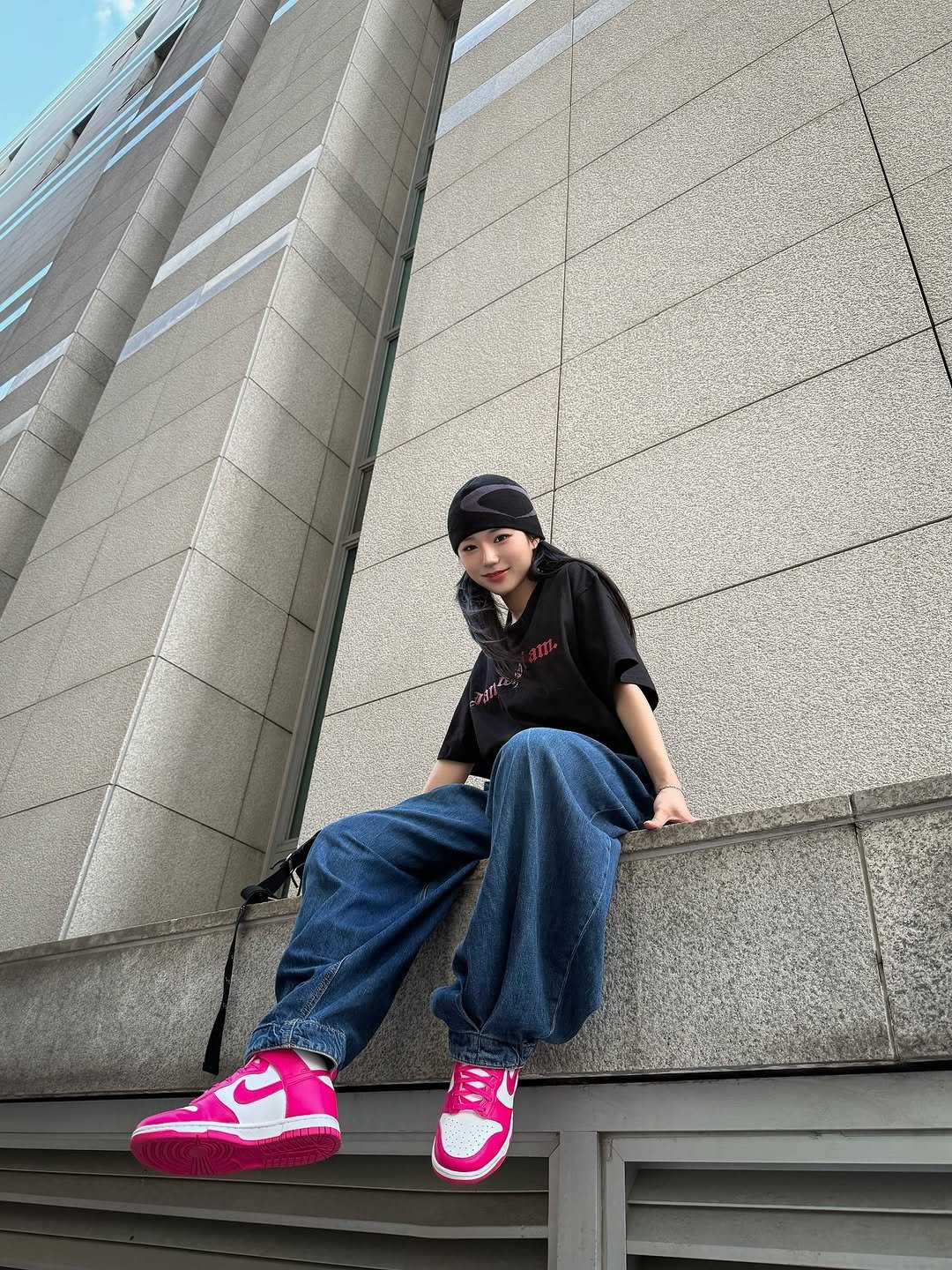 Photo shared by 미우 MIU on August 07, 2025 tagging @mwoong_one, and @mwoong_official. May be an image of 1 person, sneakers, sweatpants, sportswear, bandanna and text.